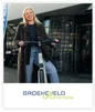 vrouw op een fiets met Groeneveld Fietsen logo